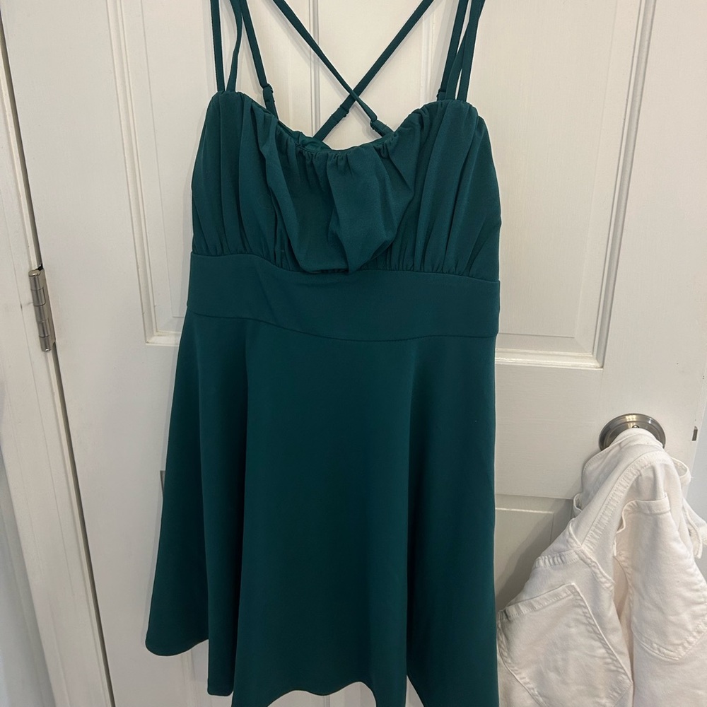 blueish- green dress !